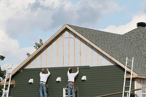 Professional Emergency Siding Repair technician working in Milford, IL
